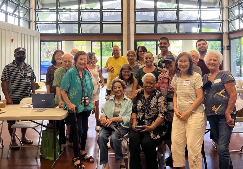 Community members learning together in a classroom setting